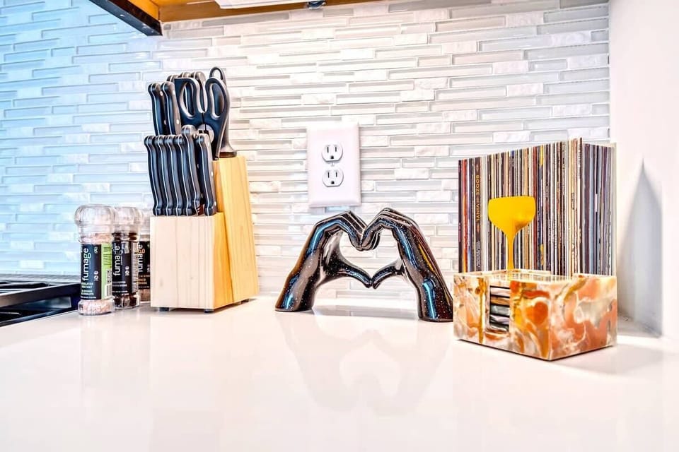 Welcome to your Nashville vacation rental! This chic kitchen is ideal for culinary adventures, whether hosting family or a bachelorette party. Enjoy modern amenities and Nashville charm in your stylish getaway!