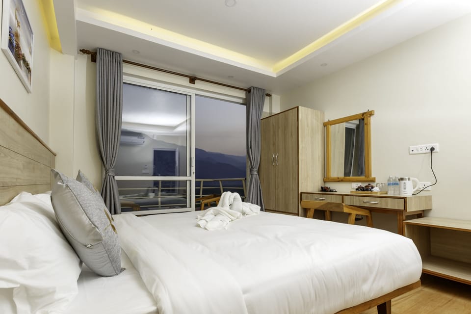 Premium bedding, desk, laptop workspace, soundproofing