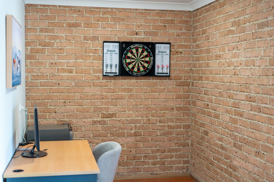 Dartboard in office niche downstairs