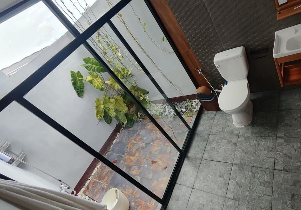 Family Double or Twin Room | Bathroom | Shower, rainfall showerhead, free toiletries, towels