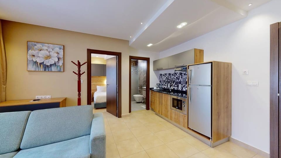 Coffee/tea maker, full-size fridge, electric kettle, highchair