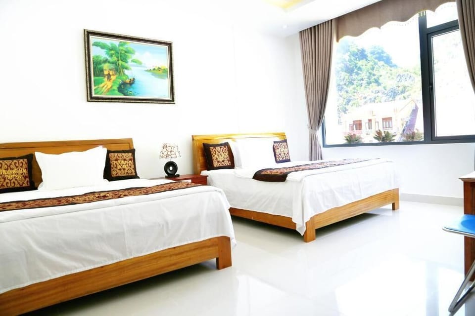 Deluxe Quadruple Room, Mountain View | Desk, soundproofing, free WiFi, bed sheets