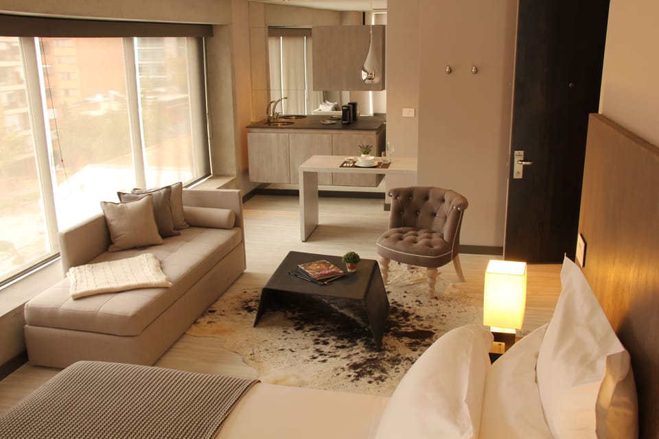 King Suite | Premium bedding, in-room safe, desk, soundproofing