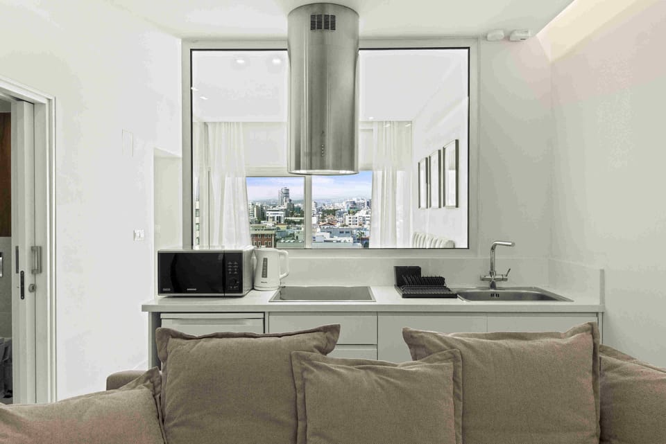 Luxury Suite | 1 bedroom, in-room safe, blackout drapes, iron/ironing board