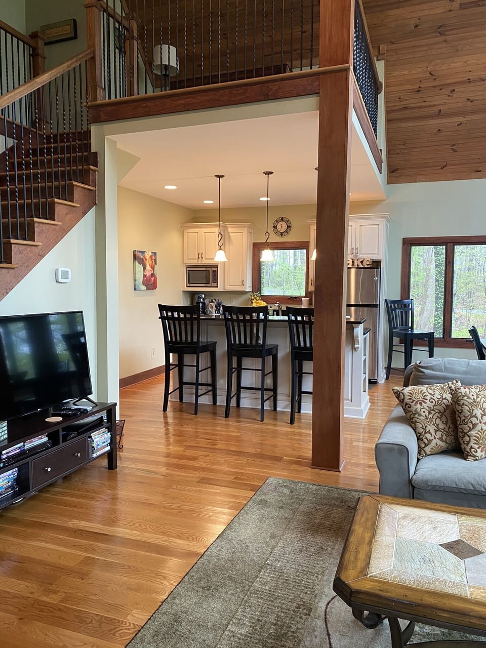 Open kitchen with bar seating.  