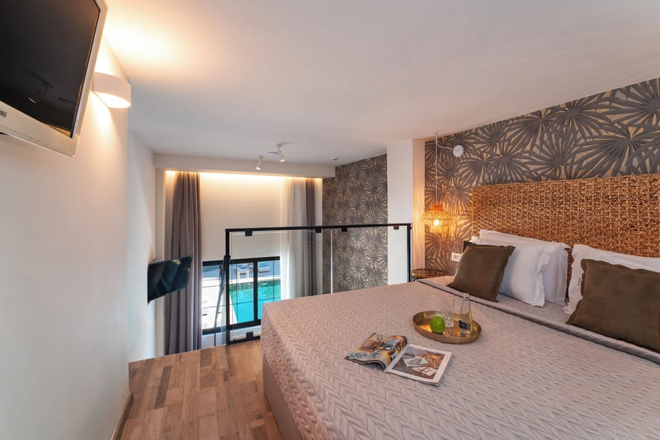 Superior Triple Room, Pool View | In-room safe, blackout drapes, soundproofing, iron/ironing board