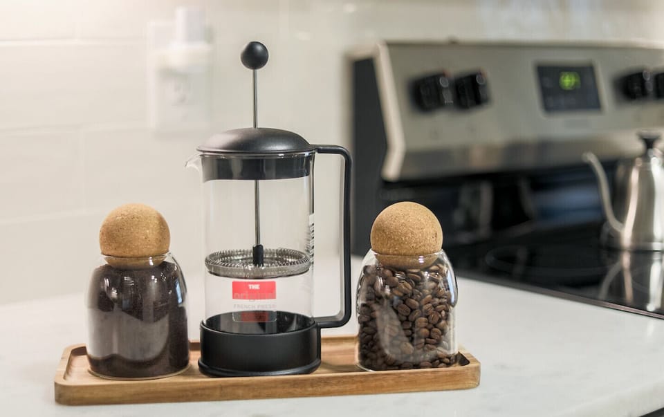 Ground and whole Coffee Beans with Espresso Press