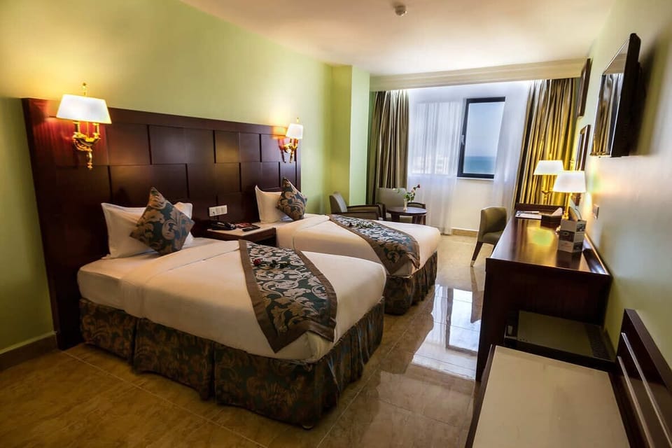Basic Double or Twin Room, 1 Bedroom, Private Bathroom, City View | Premium bedding, minibar, blackout drapes, WiFi (free)