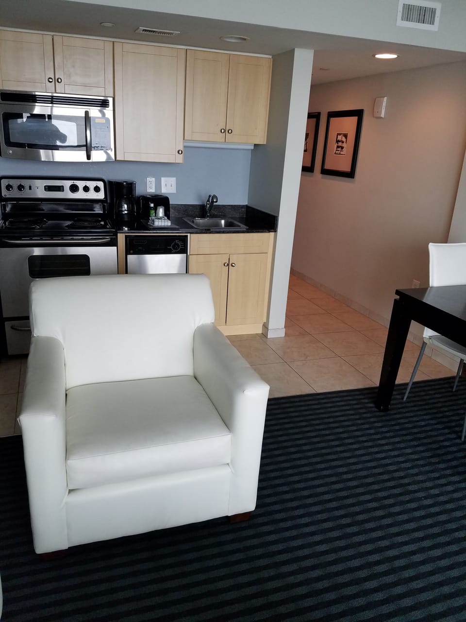 Condo, 1 Bedroom with One King Bed and Balcony, Oceanfront | Living area | 40-inch flat-screen TV with digital channels, TV, DVD player