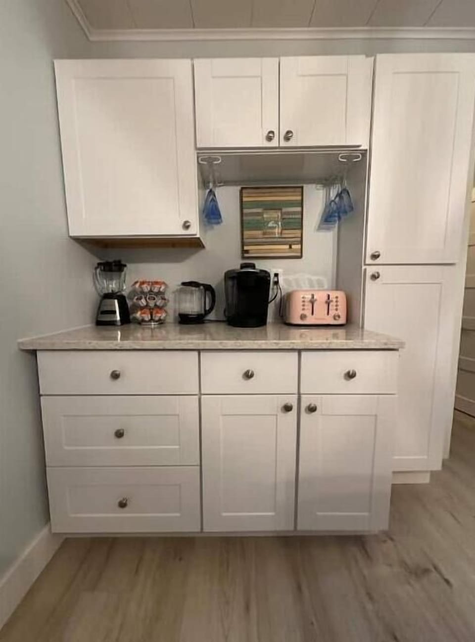 Coffee bar with complimentary coffee, tea and hot chocolate and appliances