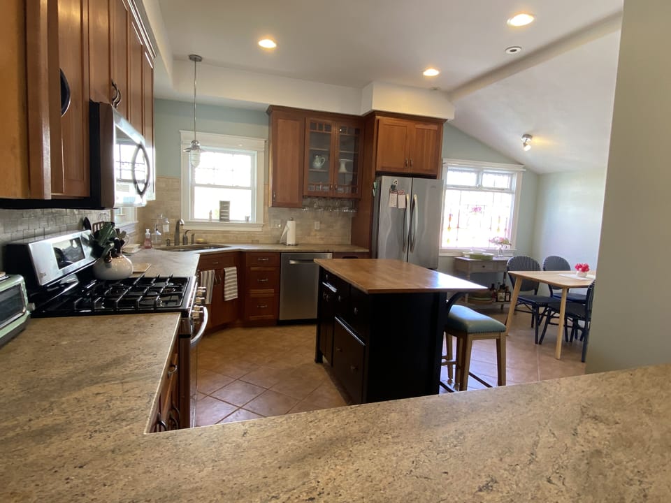 Another view of kitchen--plenty of counter space for meal prep and entertaining