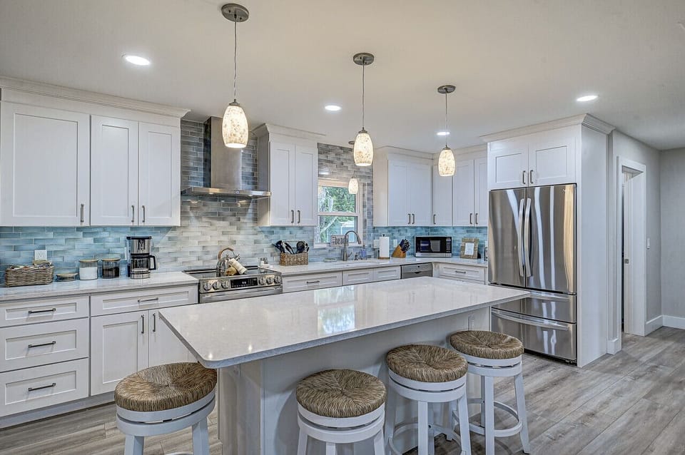 Fully equipped kitchen with large island.