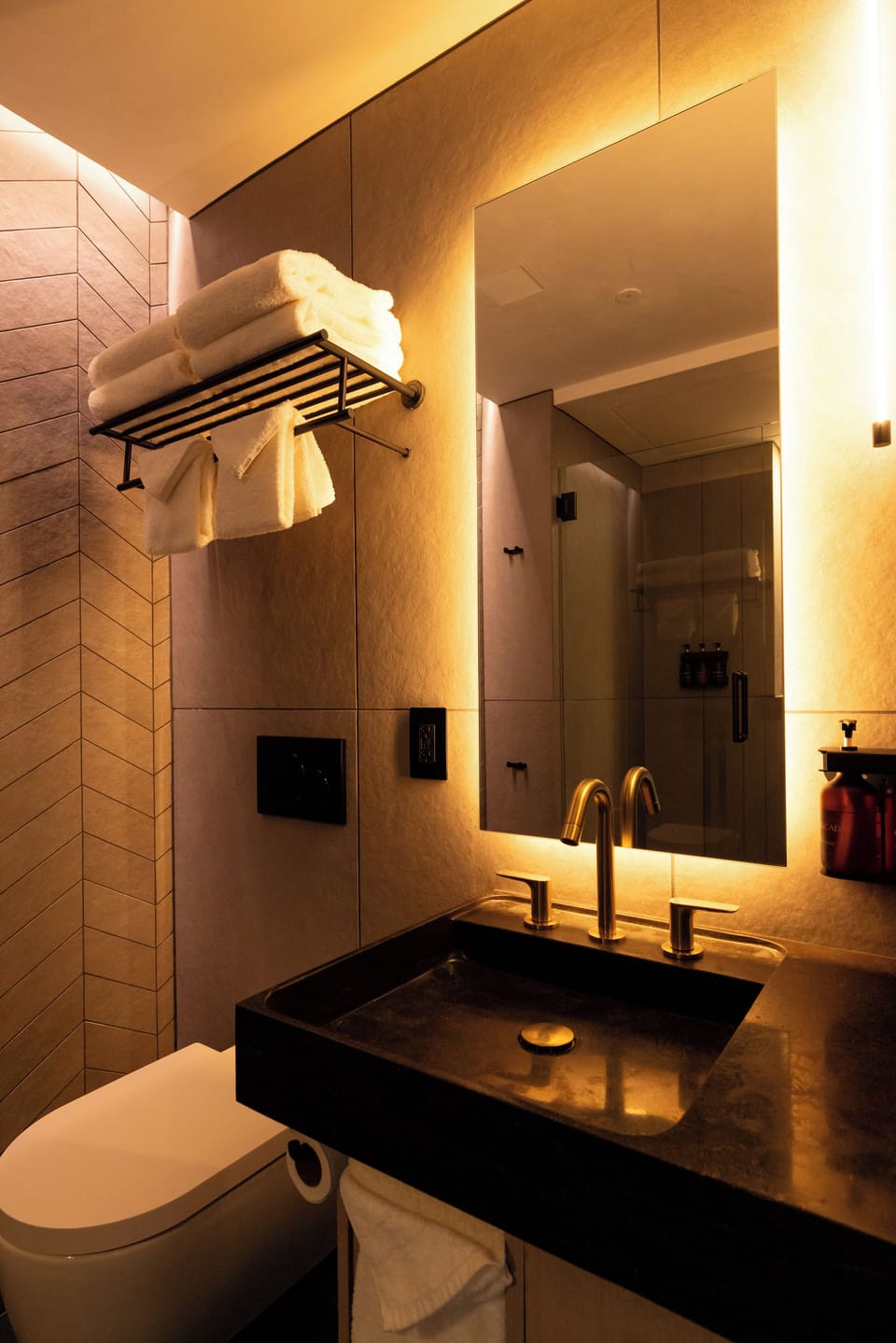 Designer toiletries, hair dryer, bathrobes, towels