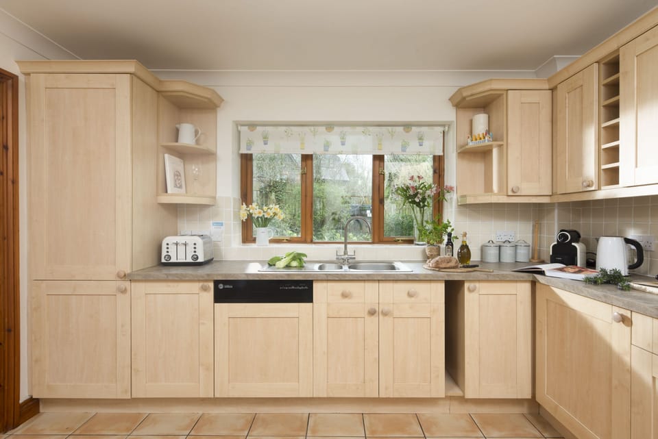 Godolphin, Roserrow. Ground Floor: With an electric oven and hob, fridge/freezer, coffee machine and dishwasher