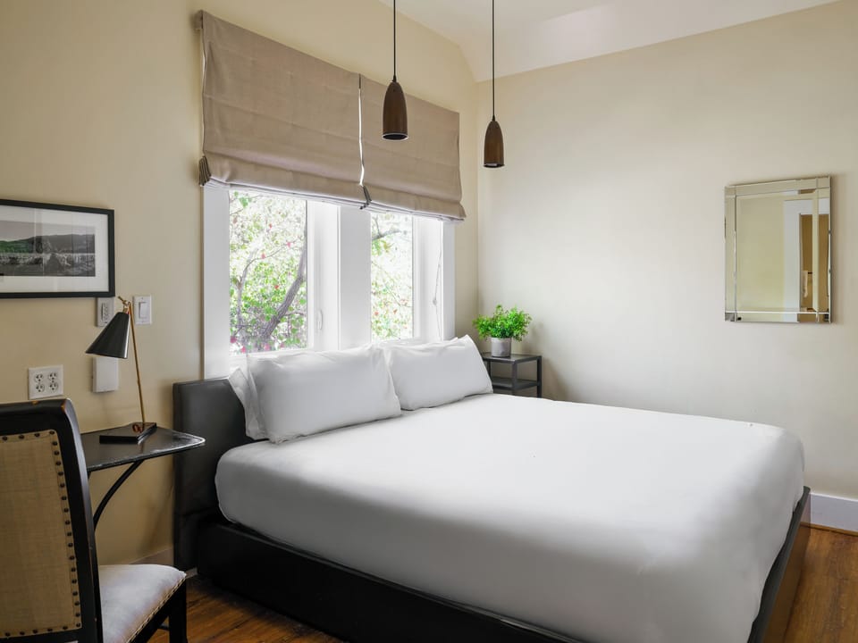 Petite Vintners King + Spa | Premium bedding, down comforters, pillowtop beds, desk