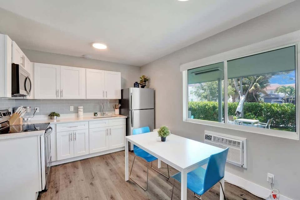 Open kitchen and dining area with garden view