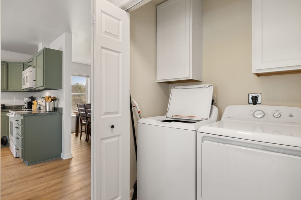 Laundry room with washer and dryer for a hassle-free vacation.