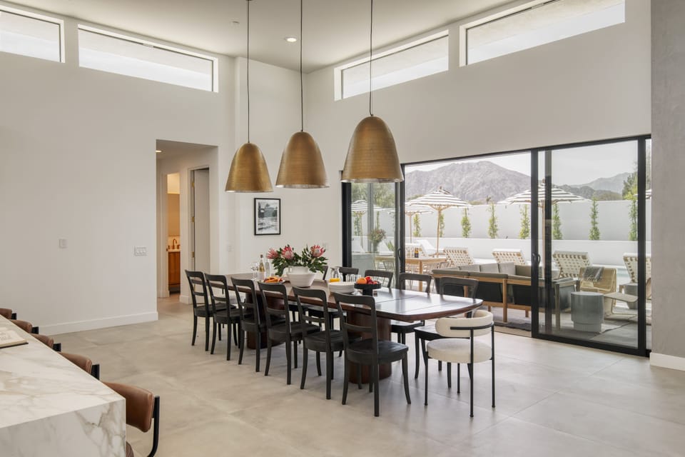 The group-friendly dining table has seating for 14.