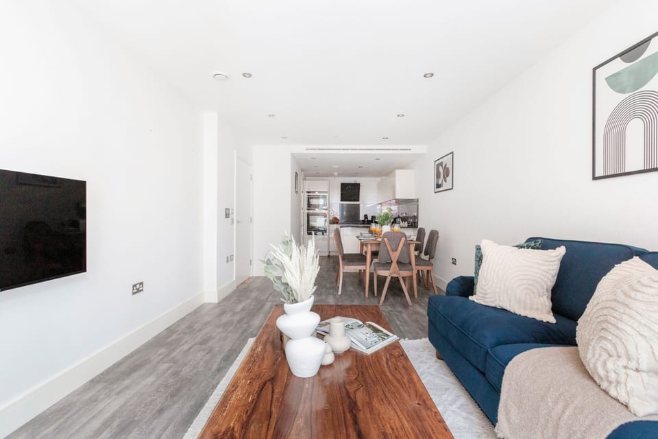 City Apartment | Living area | 40-inch Smart TV with satellite channels