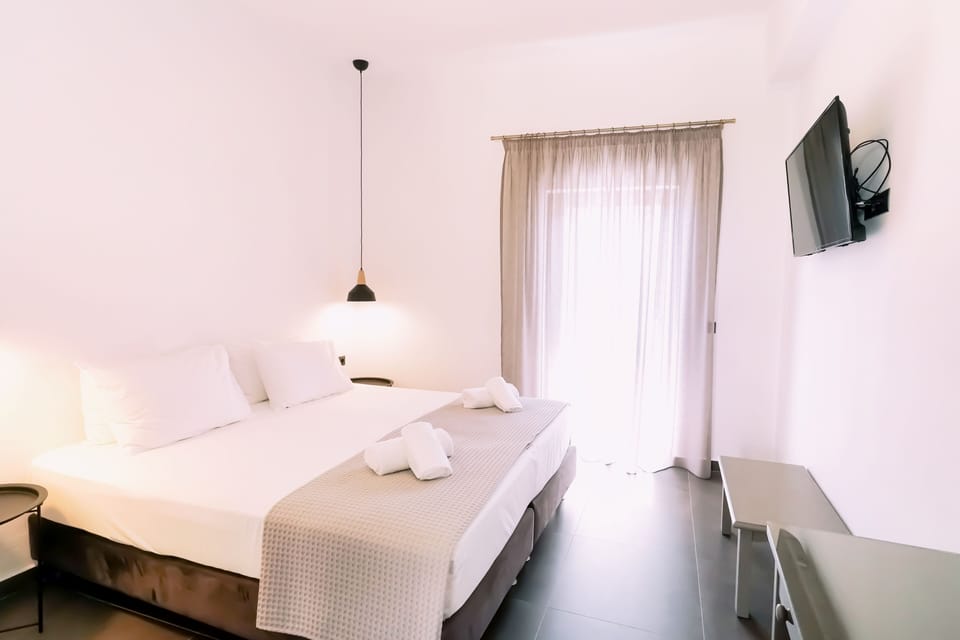 Panoramic Double Room, Partial Sea View | Free minibar items, in-room safe, free WiFi, bed sheets