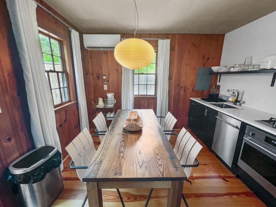Combined dining and kitchen space offers cozy convenience