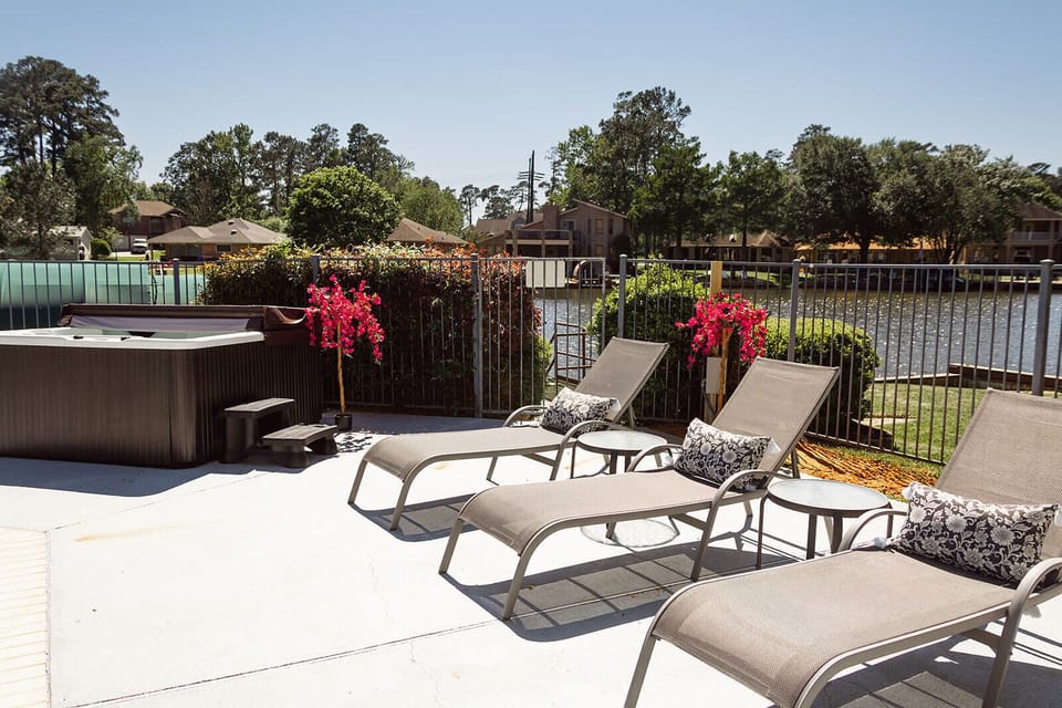 Comfortable lounge chairs by the pool. There are more available in the garage