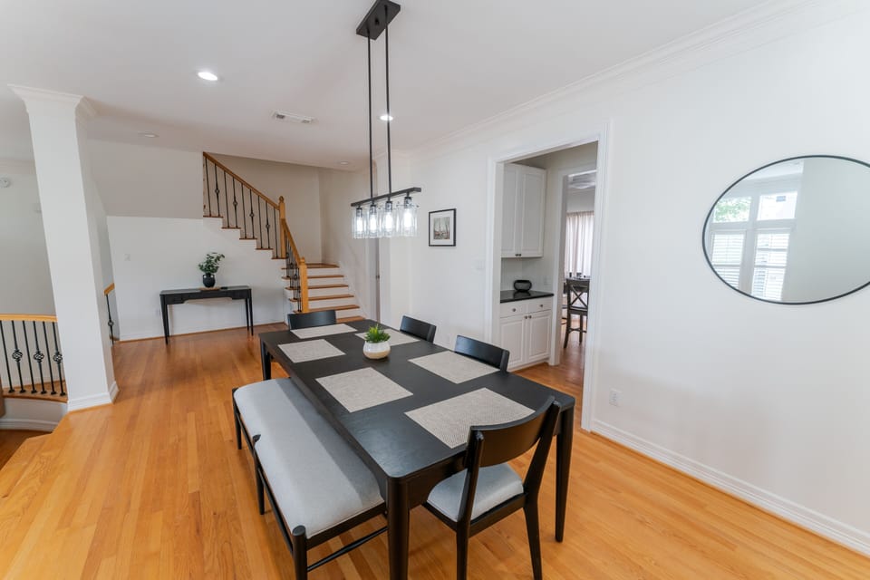 The formal dining space accommodates seating for six.