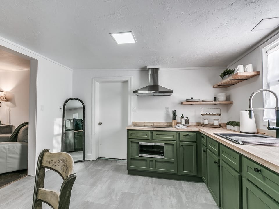 There is no door from the apartment bedroom to the kitchenette/dining area, however the kitchenette is stocked with supplies for a 2-person stay!