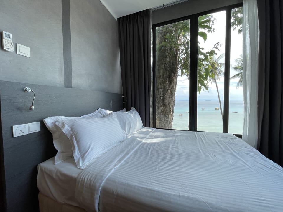Family Suite, 2 Bedrooms All Meals and Boat Transfers Included | In-room safe, desk, blackout drapes, free WiFi