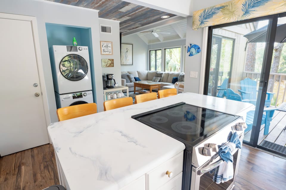 The new driftwood style shiplap ceiling wraps from the kitchen ceiling!