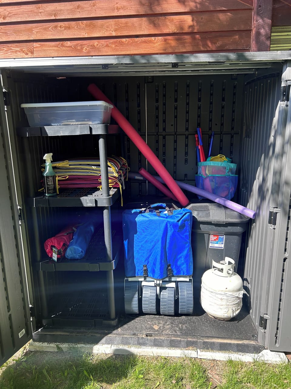 Beach wagon and toys , 2 canvas chairs , multiple other chairs for sitting