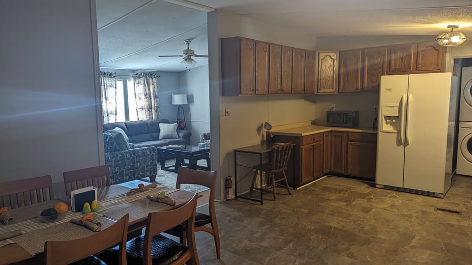 Convenient dining space, and dedicated desk/work space.