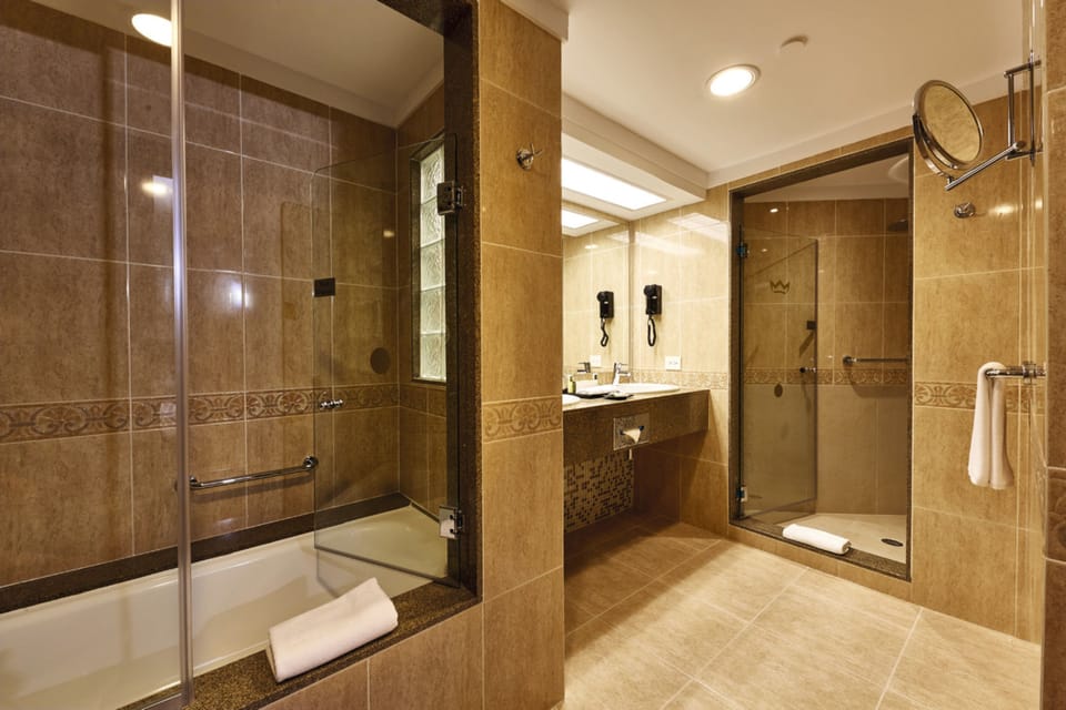 Eco-friendly toiletries, hair dryer, bathrobes, towels