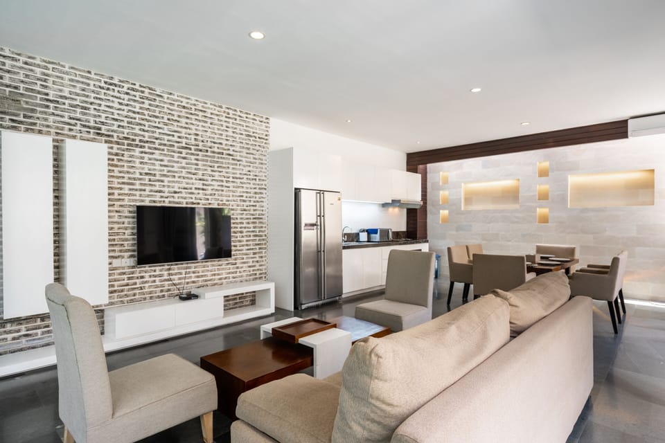 Villa | Living area | 55-inch Smart TV with digital channels