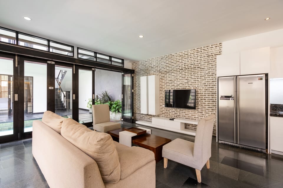 Villa | Living area | 55-inch Smart TV with digital channels