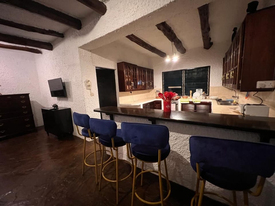 Comfort Villa | Private kitchen | Fridge, microwave, cookware/dishes/utensils, dining tables