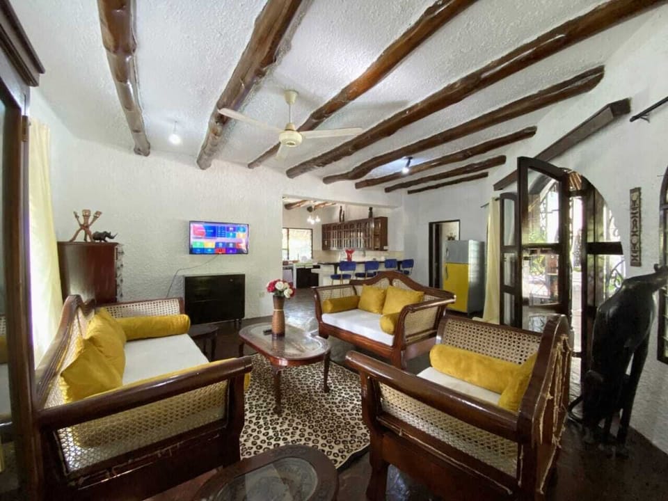 Comfort Villa | Living area | 24-inch Smart TV with digital channels