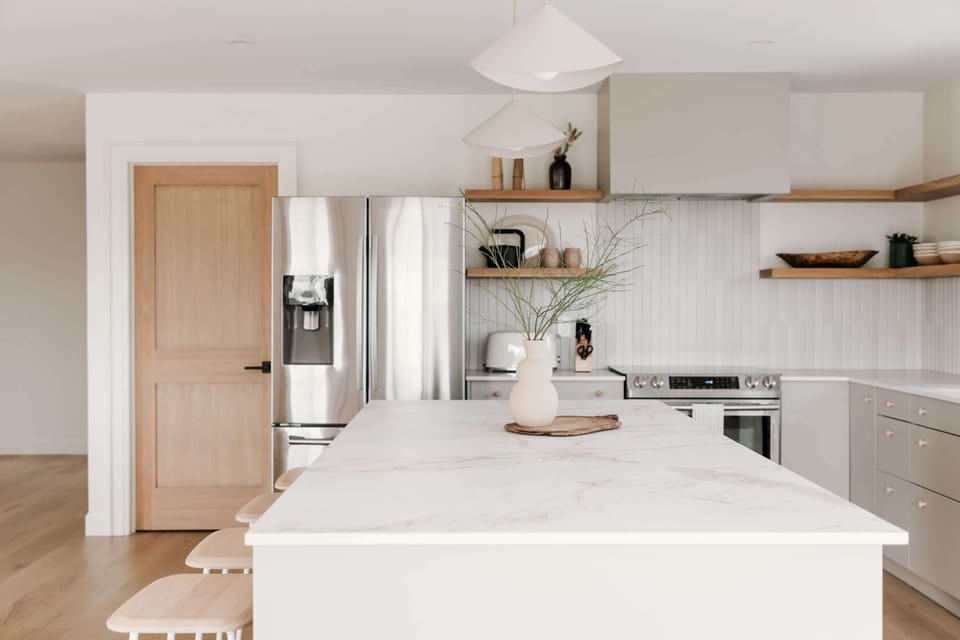 A stone countertop is a focal point of the kitchen where we want guests to enjoy slow travel