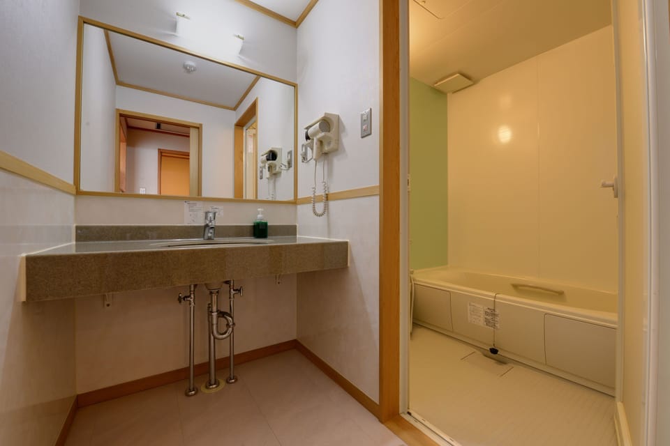 Family Room, Private Bathroom, Mountain View | Bathroom | Free toiletries, hair dryer, slippers, towels