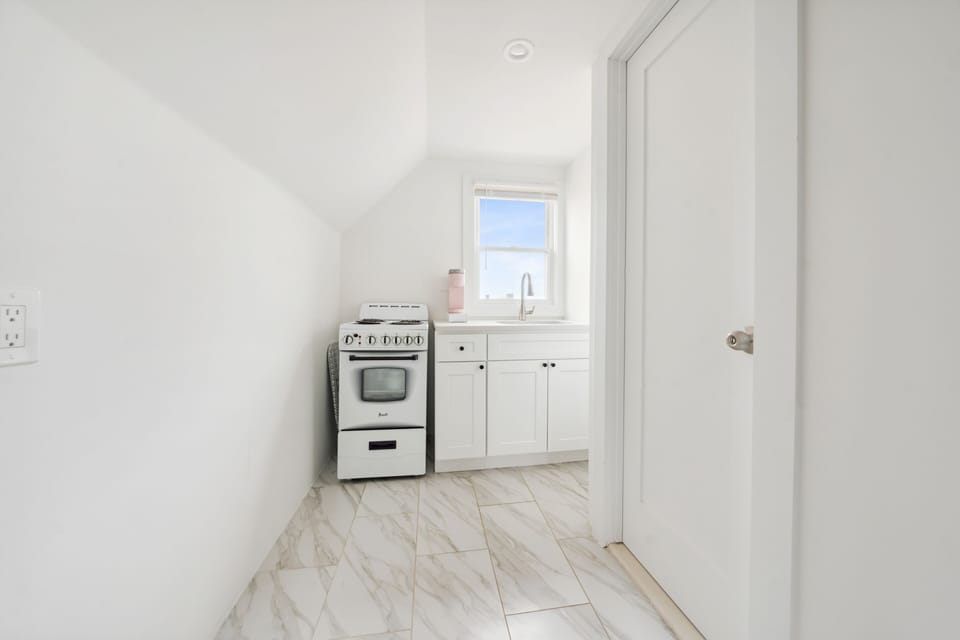 Luxury Apartment | Private kitchen | Full-size fridge, microwave, oven, stovetop