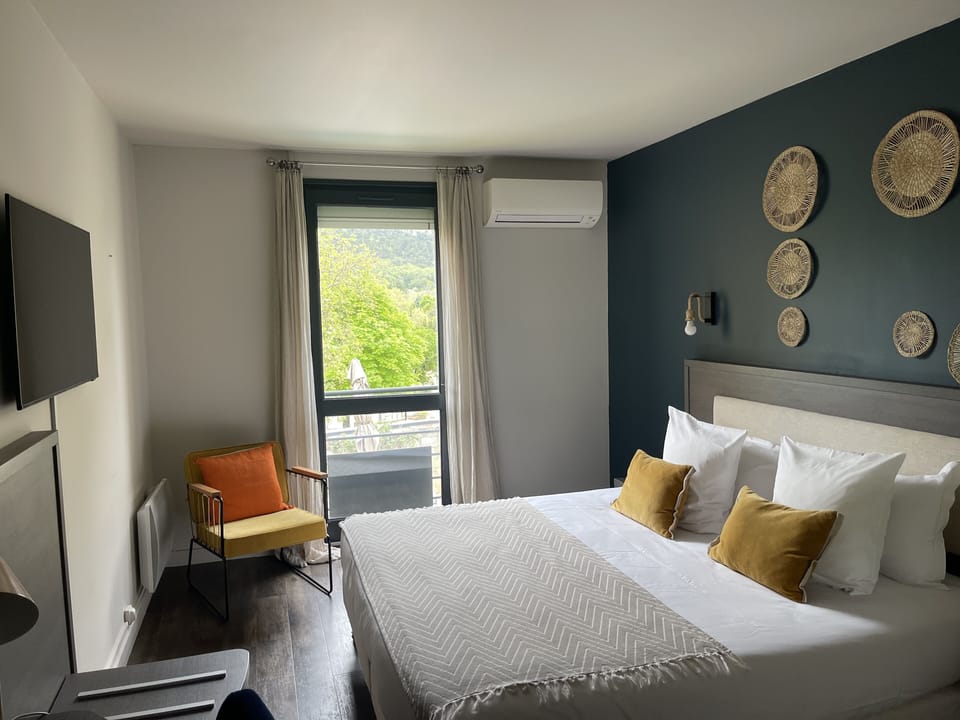 Standard Room, Pool View | Individually decorated, individually furnished, desk, soundproofing