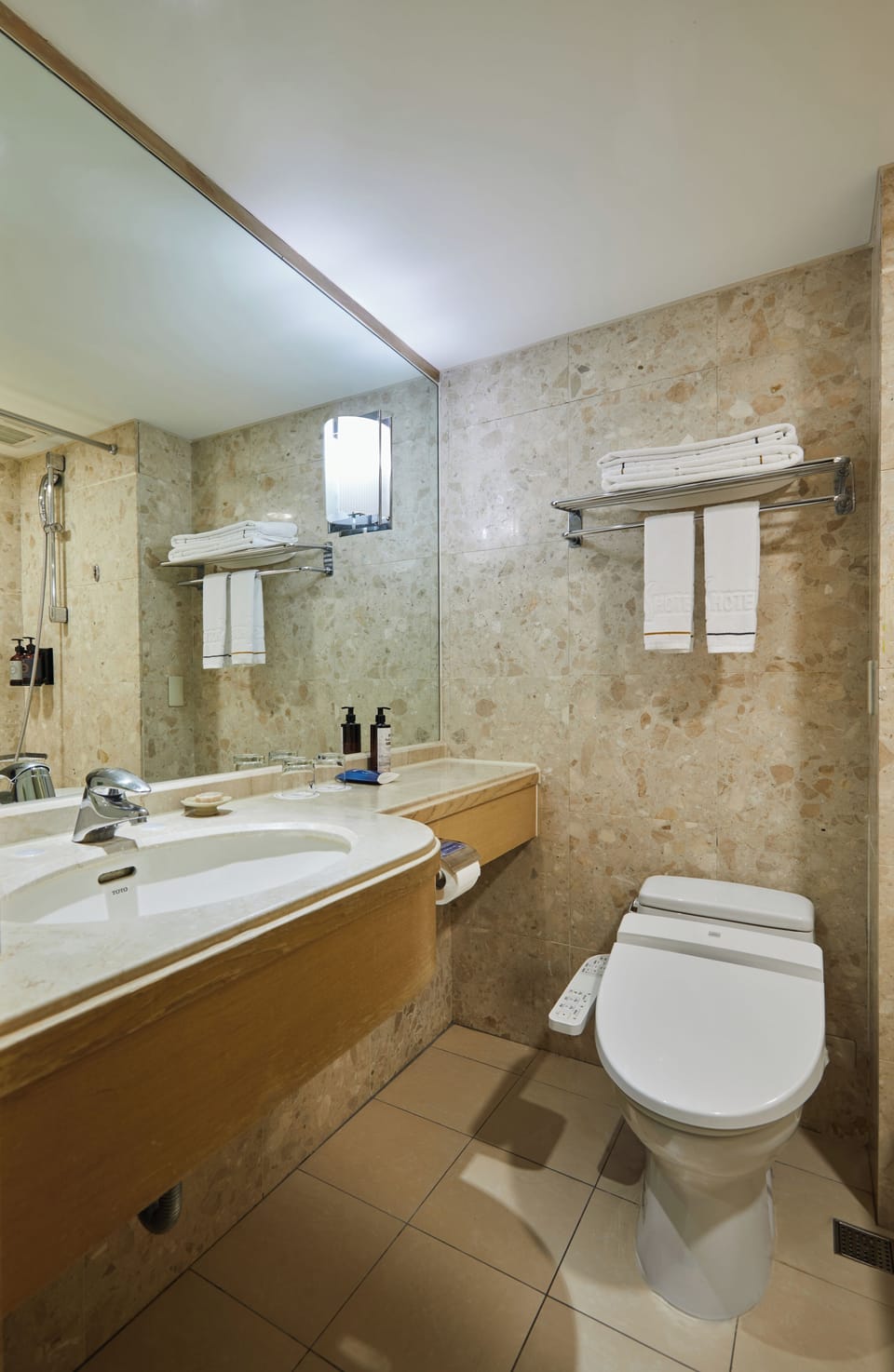 Hair dryer, slippers, towels