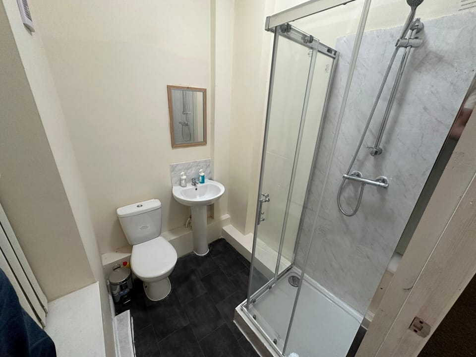 Rainfall showerhead, free toiletries, hair dryer, towels