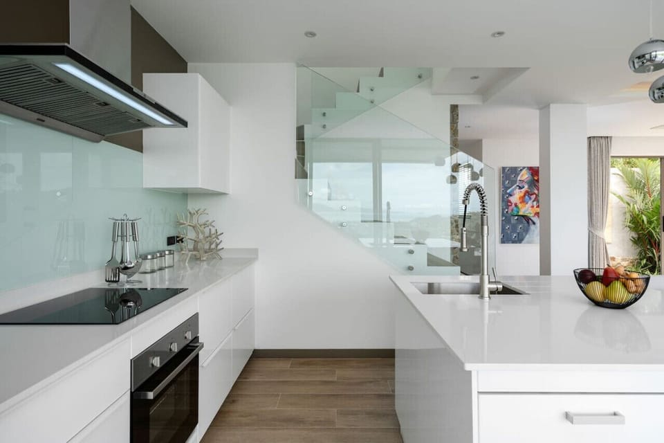 `Fully equipped kitchen with modern appliances for your culinary adventures.`