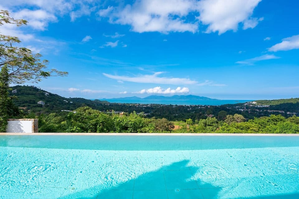 `Wake up to enchanting views of our neighbor, Koh Phangan, right from your bedroom.`