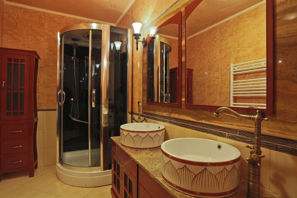 Shower, free toiletries, hair dryer, slippers