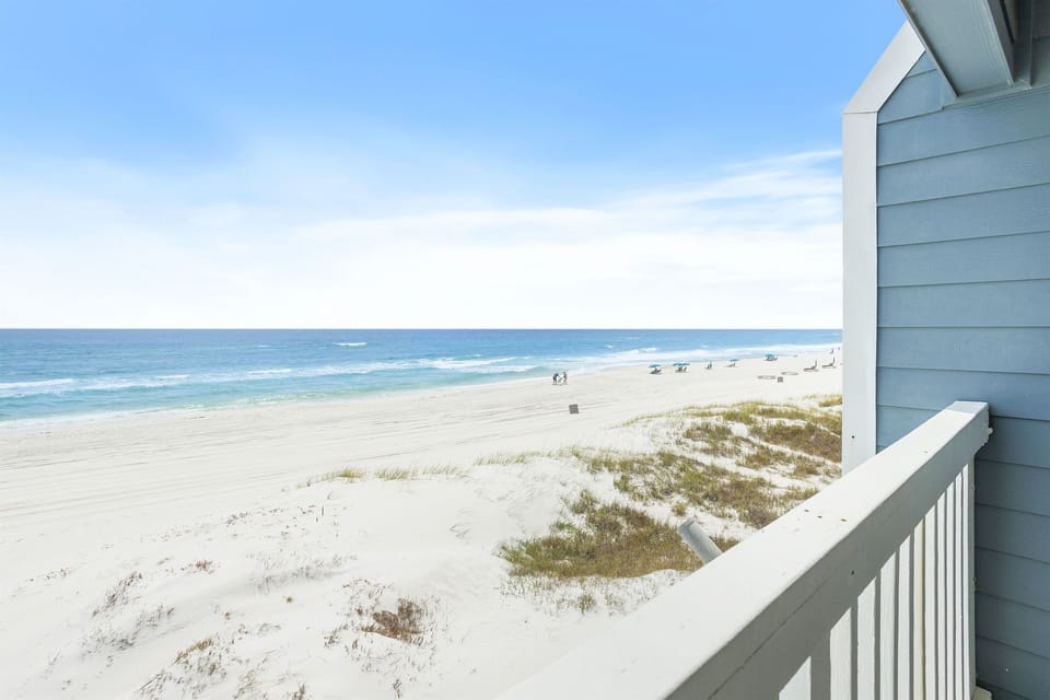 Wake up to stunning ocean views from your private balcony, where endless beach stretches invite morning walks and peaceful moments.