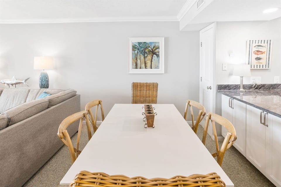 Your bright dining space flows seamlessly into the living room, perfect for sharing meals and making memories together.