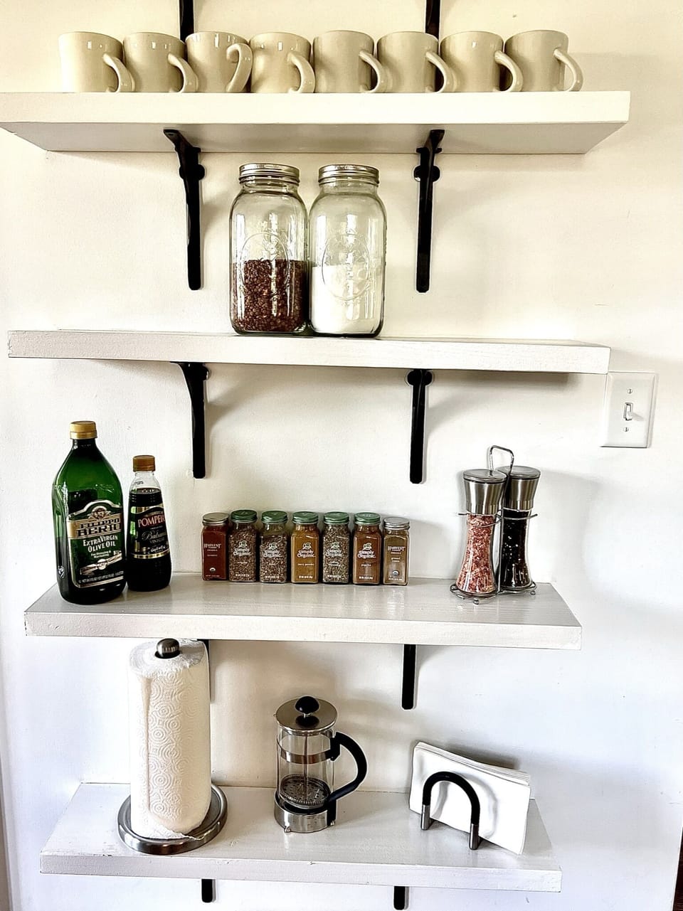 Pantry: spices, sugar, Olive Oil, and Balsamic Vinegar, and other supplies for the kitchen.