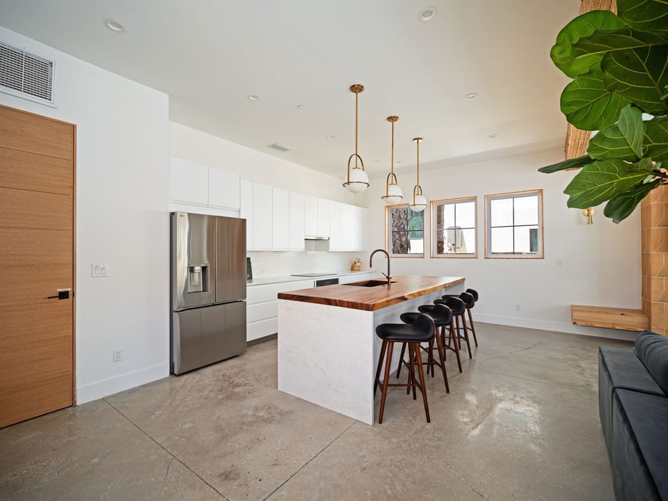 Bright kitchen and breakfast nook designed for long, lingering mornings